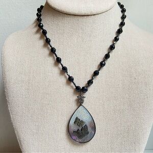 Monet gray shell butterfly teardrop pendant necklace on black glass bead strand